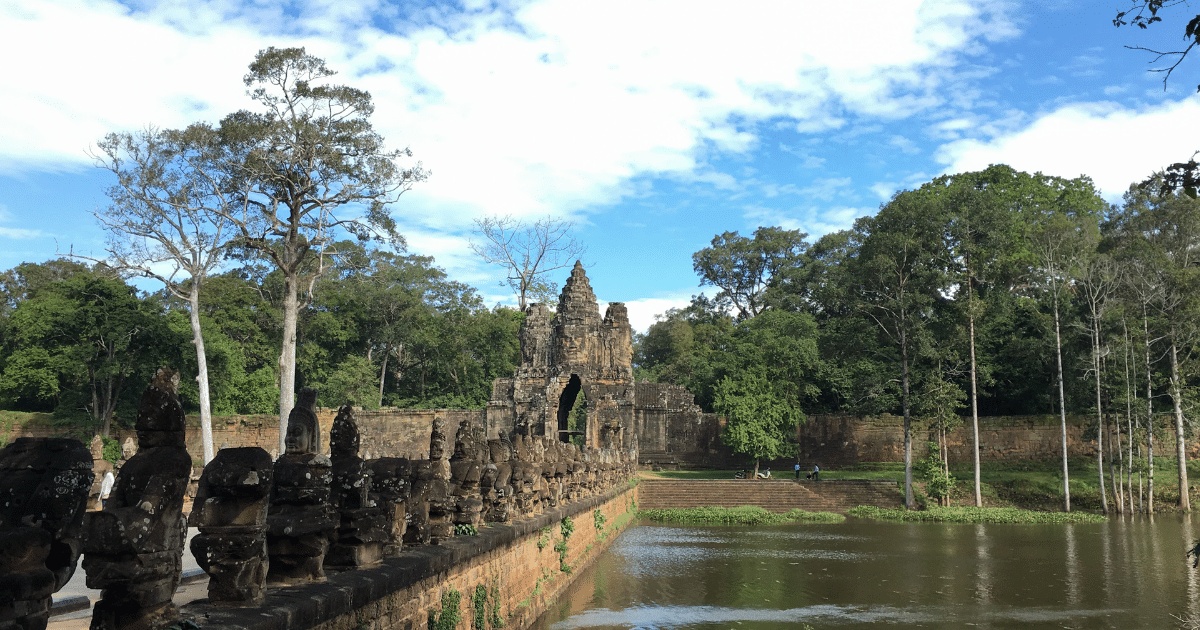 The South Gate of Angkor Thom is one of the most iconic and impressive entrances to the ancient city of Angkor Thom in Siem Reap, Cambodia. This monumental gate is a testament to the grandeur and architectural brilliance of the Khmer Empire, which once ruled over this magnificent city.